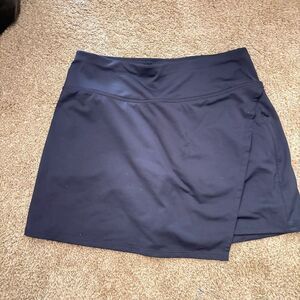 Athleta Navy blue skort asymmetrical hem Size Small
